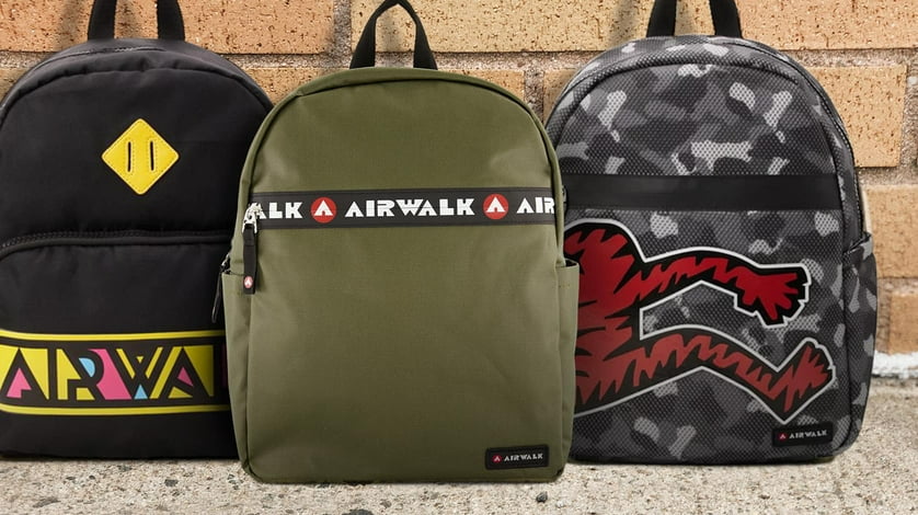 Three Airwalk backpacks on the ground.